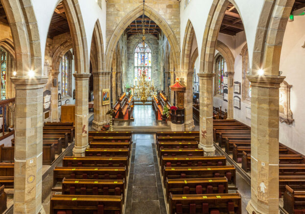 An interior shot of the arches within Lancaster Priory