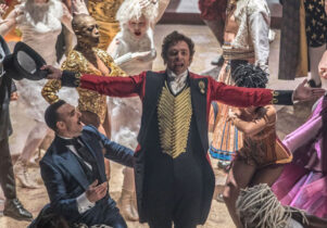 Hugh Jackman singing in a scene from The Greatest Showman