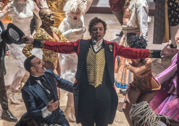 Hugh Jackman singing in a scene from The Greatest Showman