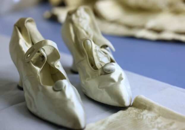 Cream shoes which belonged to Lady Lever, on display in the new exhibition 'Inspired by Lady Lever'