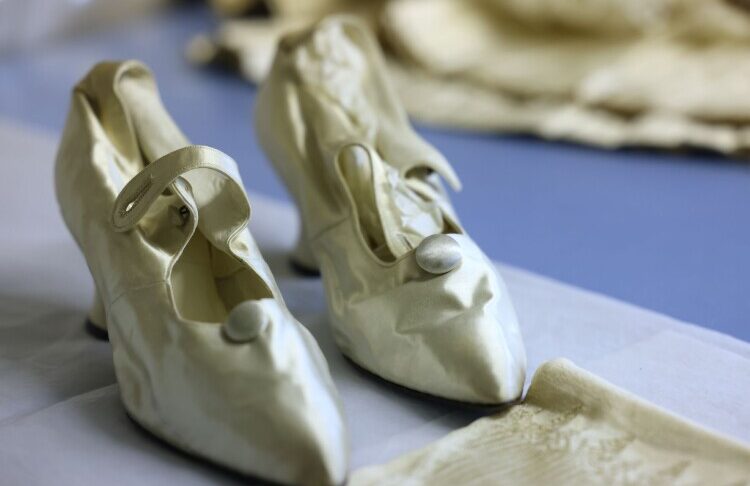 Cream shoes which belonged to Lady Lever, on display in the new exhibition 'Inspired by Lady Lever'