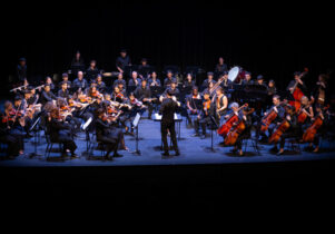 Musicians of the Afghan Youth Orchestra performing on stage