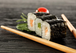 Sushi rolls with chopsticks