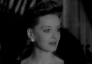 A still from Now, Voyager featuring Charlotte Vale played by Bette Davis.