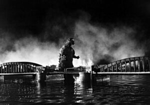 A still from the original Godzilla, showing the monster terrorising Tokyo.