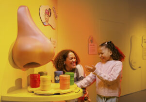 Mother and daughter play with smell interactive_Operation Ouch! Brains, Bogies and You