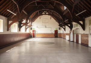 Inside main hall Birch Community Centre, showing high hammer-beam ceiling.
