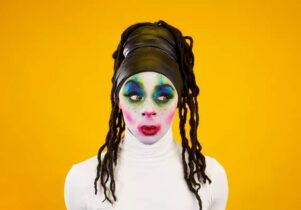 Factory Pride: Family at Aviva Studios - Image of a girl with her hair up and colourful face paint on her face