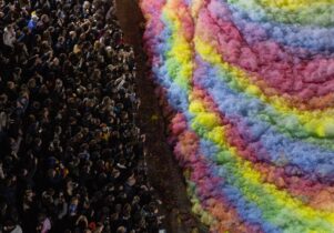 Island of Foam: Version #40 at Centenary Square: Large crowd of people watching the island of foam