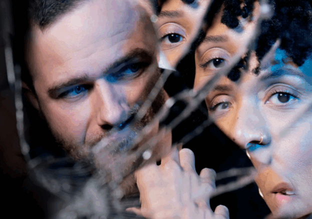 Lost Atoms at Liverpool Everyman: A broken mirror distorting the faces of a man and woman