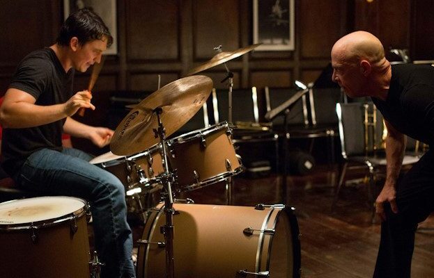 An iconic scene from the film Whiplash; Terence Fletcher aproaches Andrew Neiman menacingly as he plays the drums