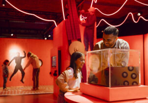 Father and daughter looking at a sundial display in Horrible Science: Cosmic Chaos