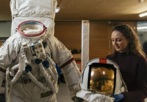 Work to prepare space suit replica for display in Horrible Science - Science Museum Group -Drew Forsyth