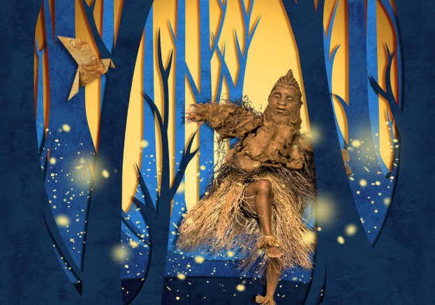 A dancer wearing a light brown costume and puppet mask, moves in a glowing forest of tall blue and golden trees, surrounded by floating firefly-like lights.
