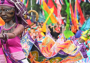 Colourful puppets in a parade